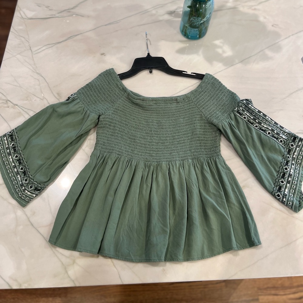 Francesca’s Blue Rain Peplum top Sz M